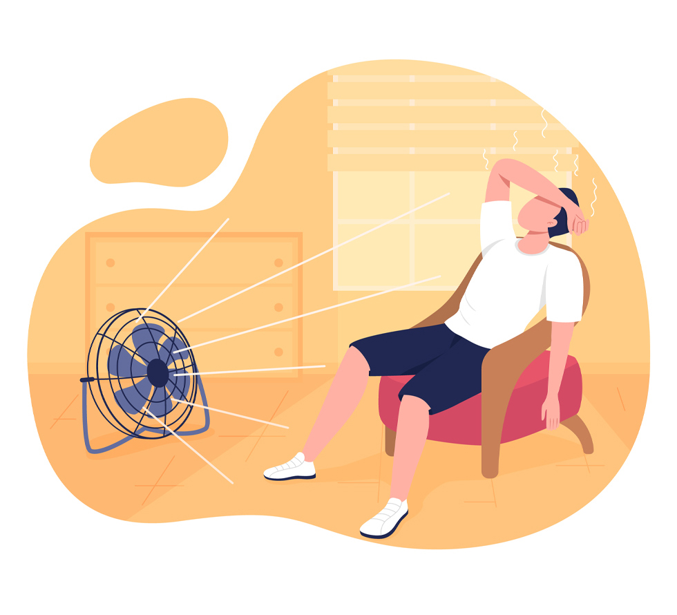 A person sitting in front of a fan.